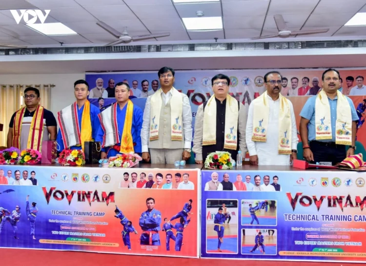 Mr. Praveen Garg, President of the Vovinam Association of India and Secretary General of the Asian Vovinam Federation (far right, in blue); Master Huynh Khac Nguyen, Technical Director of the World Vovinam Federation (third from left); and Pham Chi Thinh, Coach of the Technical Committee of the Vietnam Vovinam Federation (second from left).